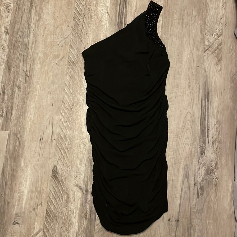 This is a 2000’s black dress from YA Los Angela’s
